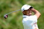 Tiger Woods Shakes Off Arm Pain