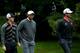 ARDMORE, PA - JUNE 14: (L-R) Rory McIlroy of Northern Ireland, Tiger Woods of the United States and Adam Scott of Australia walk the 12th fairway during a continuation of Round One of the 113th U.S. Open at Merion Golf Club on June 14, 2013 in Ardmore, Pennsylvania. (Photo by Andrew Redington/Getty Images)