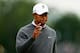 ARDMORE, PA - JUNE 14: Tiger Woods of the United States waves on the 18th green during a continuation of Round One of the 113th U.S. Open at Merion Golf Club on June 14, 2013 in Ardmore, Pennsylvania. (Photo by Scott Halleran/Getty Images)