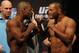 Jun 14, 2013; Winnipeg, Manitoba, Canada; Rashad Evans and Dan Henderson square off during the weigh in at UFC 161 at the MTS Center. Mandatory Credit: Bruce Fedyck-USA TODAY Sports