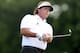 ARDMORE, PA - JUNE 14: Phil Mickelson of the United States plays his tee shot on the ninth hole during Round Two of the 113th U.S. Open at Merion Golf Club on June 14, 2013 in Ardmore, Pennsylvania. (Photo by Ross Kinnaird/Getty Images)