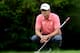 ARDMORE, PA - JUNE 14: Adam Scott of Australia lines up a putt on the tenth hole during Round Two of the 113th U.S. Open at Merion Golf Club on June 14, 2013 in Ardmore, Pennsylvania. (Photo by David Cannon/Getty Images)