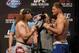 Jun 14, 2013; Winnipeg, Manitoba, Canada; Roy Nelson and Stipe Miocic square off during the weigh in at UFC 161 at the MTS Center. Mandatory Credit: Bruce Fedyck-USA TODAY Sports