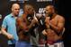 Jun 14, 2013; Winnipeg, Manitoba, Canada; Rashad Evans and Dan Henderson square off during the weigh in at UFC 161 at the MTS Center. Mandatory Credit: Bruce Fedyck-USA TODAY Sports