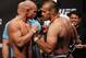 Jun 14, 2013; Winnipeg, Manitoba, Canada; Ryan Jimmo and Igor Pokrajac square off during the weigh in at UFC 161 at the MTS Center. Mandatory Credit: Bruce Fedyck-USA TODAY Sports