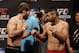 Jun 14, 2013; Winnipeg, Manitoba, Canada; Mitch Clarke and John Maguire pose for photos during the weigh in at UFC 161 at the MTS Center. Mandatory Credit: Bruce Fedyck-USA TODAY Sports