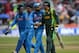 BIRMINGHAM, ENGLAND - JUNE 15: Virat Kohli of India shakes hands with Pakistan captain Misbah-ul-Haq as rain stops play during the ICC Champions Trophy match between India and Pakiatan at Edgbaston on June 15, 2013 in Birmingham, England. (Photo by Gareth Copley/Getty Images)
