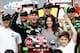 BROOKLYN, MI - JUNE 17: Dale Earnhardt Jr., driver of the #88 Diet Mountain Dew/TheDarkKnightRises/National Guard/ Chevrolet, celebrates with his girlfriend Amy Reimann in Victory Lane after winning the NASCAR Sprint Cup Series Quicken Loans 400 at Michigan International Speedway on June 17, 2012 in Brooklyn, Michigan. (Photo by Jeff Zelevansky/Getty Images)