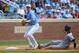 June 11, 2013; Chapel Hill, NC, USA; North Carolina third basemen Colin Moran (18) gets ready to make a throw during the 5th inning against the South Carolina Gamecocks at the Chapel Hill Super Regional of the NCAA baseball tournament at Boshamer Stadium. The Tar Heels defeated the Gamecocks 5-4. Mandatory Credit: James Guillory-USA TODAY Sports