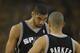 OAKLAND, CA - MAY 10: Tim Duncan #21 and Tony Parker #9 of the San Antonio Spurs look on against the Golden State Warriors in Game Three of the Western Conference Semifinals during the 2013 NBA Playoffs on May 10, 2013 at the Oracle Arena in Oakland, California. NOTE TO USER: User expressly acknowledges and agrees that, by downloading and or using this photograph, User is consenting to the terms and conditions of the Getty Images License Agreement. Mandatory Copyright Notice: Copyright 2013 NBAE (Photo by Jed Jacobsohn/Getty Images)