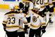 CHICAGO, IL - JUNE 15: (L-R) Zdeno Chara #33 and Patrice Bergeron #37 of the Boston Bruins celebrate after the Bruins won 2-1 in overtime against the Chicago Blackhawks in Game Two of the NHL 2013 Stanley Cup Final at United Center on June 15, 2013 in Chicago, Illinois. (Photo by Gregory Shamus/Getty Images)