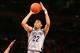 Mar 14, 2013; New York, NY, USA; Georgetown Hoyas forward Otto Porter Jr. (22) shoots over Cincinnati Bearcats guard JaQuon Parker (44) during the first half at the Big East tournament at Madison Square Garden. Mandatory Credit: Debby Wong-USA TODAY Sports