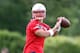 Jun 12, 2013; Foxborough, MA, USA; New England Patriots quarterback Tim Tebow passes the ball during minicamp at the practice fields of Gillette Stadium. Mandatory Credit: Stew Milne-USA TODAY Sports