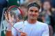 PARIS, FRANCE - JUNE 02: Roger Federer of Switzerland celebrates match point in his Men's Singles match against Gilles Simon of France during day eight of the French Open at Roland Garros on June 2, 2013 in Paris, France. (Photo by Julian Finney/Getty Images)