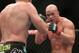 Jun 15, 2013; Winnipeg, MB, Canada; Ryan Jimmo (right) fights Igor Pokrajac during their light heavyweight bout at UFC 161 at MTS Centre. Mandatory Credit: Tom Szczerbowski-USA TODAY Sports
