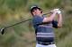 ARDMORE, PA - JUNE 15: Jason Dufner of the United States hits his tee shot on the 18th hole during the continuation of Round Two of the 113th U.S. Open at Merion Golf Club on June 15, 2013 in Ardmore, Pennsylvania. (Photo by Ross Kinnaird/Getty Images)