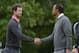 Jun 14, 2013; Ardmore, PA, USA; Adam Scott (left) and Tiger Woods (right) shake hands after the first round of the 113th U.S. Open golf tournament at Merion Golf Club. Mandatory Credit: Eileen Blass-USA TODAY