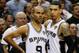 SAN ANTONIO, TX - JUNE 16: Tony Parker #9 and Danny Green #4 of the San Antonio Spurs celebrate late in the fourth quarter while taking on the Miami Heat during Game Five of the 2013 NBA Finals at the AT&T Center on June 16, 2013 in San Antonio, Texas. NOTE TO USER: User expressly acknowledges and agrees that, by downloading and or using this photograph, User is consenting to the terms and conditions of the Getty Images License Agreement. (Photo by Kevin C. Cox/Getty Images)