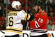 CHICAGO, IL - JUNE 12: Kaspars Daugavins #16 of the Boston Bruins argues with Jonathan Toews #19 of the Chicago Blackhawks in Game One of the NHL 2013 Stanley Cup Final at United Center on June 12, 2013 in Chicago, Illinois. (Photo by Bruce Bennett/Getty Images)