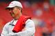 BOSTON, MA - MAY 11: Head coach of the Ohio State University Buckeyes football team, Urban Meyer, stands on the field prior to the game between the Boston Red Sox and the Toronto Blue Jays on May 11, 2013 at Fenway Park in Boston, Massachusetts. (Photo by Jared Wickerham/Getty Images)