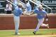 June 11, 2013; Chapel Hill, NC, USA; North Carolina catcher Brian Holberton (10) is congratulated by North Carolina third base coach after his second inning two run home run against South Carolina during the Chapel Hill Super Regional of the NCAA baseball tournament at Boshamer Stadium. Mandatory Credit: James Guillory-USA TODAY Sports