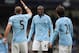 MANCHESTER, ENGLAND - FEBRUARY 24: Yaya Toure of Manchester City exchanges words with team-mate Pablo Zabaleta during the Barclays Premier League match between Manchester City and Chelsea at Etihad Stadium on February 24, 2013 in Manchester, England. (Photo by Shaun Botterill/Getty Images)