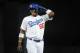 LOS ANGELES, CA - JUNE 10: Yasiel Puig #66 of the Los Angeles Dodgers waits on first base after hitting a single in the fourth inning against the Arizona Diamondbacks at Dodger Stadium on June 10, 2013 in Los Angeles, California. (Photo by Lisa Blumenfeld/Getty Images)