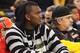 OAKLAND, CA - DECEMBER 28: Quarterback of the Oakland Raider JaMarcus Russell looks on during the Boston Celtics and the Golden State Warriors NBA game at Oracle Arena on December 28, 2009 in Oakland, California. NOTE TO USER: User expressly acknowledges and agrees that, by downloading and/or using this Photograph, user is consenting to the terms and conditions of the Getty Images License Agreement. (Photo by Jed Jacobsohn/Getty Images)