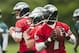 May 20, 2013; Philadelphia, PA, USA; Philadelphia Eagles quarterbacks Michael Vick (7) G.J. Kinne (4) fourth round draft pick Matt Barkley (2) and Nick Foles (9) drop back to pass during organized team activities at the NovaCare Complex. Mandatory Credit: Howard Smith-USA TODAY Sports