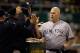 OAKLAND, CA - JUNE 12: Kevin Youkilis #36 of the New York Yankees is congratulated by teammates after he scored in the seventh inning of their game against the Oakland Athletics at O.co Coliseum on June 12, 2013 in Oakland, California. (Photo by Ezra Shaw/Getty Images)