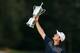 ARDMORE, PA - JUNE 16: Justin Rose of England celebrates with the U.S. Open trophy after winning the 113th U.S. Open at Merion Golf Club on June 16, 2013 in Ardmore, Pennsylvania. (Photo by Scott Halleran/Getty Images)