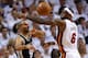 MIAMI, FL - JUNE 18: Tony Parker #9 of the San Antonio Spurs passes the ball against LeBron James #6 of the Miami Heat in the second half during Game Six of the 2013 NBA Finals at AmericanAirlines Arena on June 18, 2013 in Miami, Florida. NOTE TO USER: User expressly acknowledges and agrees that, by downloading and or using this photograph, User is consenting to the terms and conditions of the Getty Images License Agreement. (Photo by Mike Ehrmann/Getty Images)