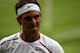 LONDON, ENGLAND - JUNE 26: Rafael Nadal of Spain reacts to a play during his Gentlemen's Singles first round match against Thomaz Bellucci of Brazil on day two of the Wimbledon Lawn Tennis Championships at the All England Lawn Tennis and Croquet Club on June 26, 2012 in London, England. (Photo by Clive Brunskill/Getty Images)