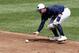 Jun 18, 2013; Omaha, NE, USA; North Carolina Tarheels second baseman Mike Zolk (3) fields the ground ball against the LSU Tigers during the College World Series at TD Ameritrade Park. Mandatory Credit: Bruce Thorson-USA TODAY Sports