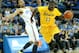 LOS ANGELES, CA - DECEMBER 18: James Ennis #11 of the Long Beach State 49ers drives around Kyle Andeerson #5 of the UCLA Bruins at Pauley Pavilion on December 18, 2012 in Los Angeles, California. (Photo by Stephen Dunn/Getty Images)