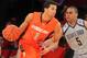 Mar 15, 2013; New York, NY, USA; Syracuse Orange guard Michael Carter-Williams (1) controls the ball against Georgetown Hoyas guard Markel Starks (5) during the first half of a semifinal game of the Big East tournament at Madison Square Garden. Mandatory Credit: Brad Penner-USA TODAY Sports