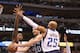 DALLAS, TX - DECEMBER 30: Manu Ginobili #20 of the San Antonio Spurs takes a shot against Vince Carter #25 of the Dallas Mavericks and Elton Brand #42 at American Airlines Center on December 30, 2012 in Dallas, Texas. NOTE TO USER: User expressly acknowledges and agrees that, by downloading and or using this photograph, User is consenting to the terms and conditions of the Getty Images License Agreement. (Photo by Ronald Martinez/Getty Images)