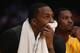 LOS ANGELES, CA - APRIL 26: Dwight Howard (L) #12 and Devin Ebanks #3 of the Los Angeles Lakers look on from the bench in the second half against the San Antonio Spurs during Game Three of the Western Conference Quarterfinals of the 2013 NBA Playoffs at Staples Center on April 26, 2013 in Los Angeles, California. The Spurs defeated the Lakers 120-89. (Photo by Jeff Gross/Getty Images)