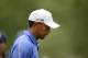 Tiger Woods strained his left elbow at the U.S. Open