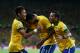 FORTALEZA, BRAZIL - JUNE 19: Jo of Brazil celebrates scoring his team's second goal with team-mates Neymar (L) and Daniel Alves (R) during the FIFA Confederations Cup Brazil 2013 Group A match between Brazil and Mexico at Castelao on June 19, 2013 in Fortaleza, Brazil. (Photo by Clive Mason/Getty Images)
