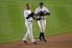 NEW YORK, NY - OCTOBER 13: (L-R) Derek Jeter #2 and Alex Rodriguez #13 of the New York Yankees talk in the field against the Detroit Tigers during Game One of the American League Championship Series at Yankee Stadium on October 13, 2012 in the Bronx borough of New York City, New York. (Photo by Bruce Bennett/Getty Images)