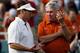 L-R: Oklahoma coach Bob Stoops and Texas coach Mack Brown