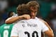 SALVADOR, BRAZIL - JUNE 20: Diego Lugano of Uruguay celebrates with Diego Forlan (r) after scoring the opening goal during the FIFA Confederations Cup Brazil 2013 Group B match between Nigeria and Uruguay at Estadio Octavio Mangabeira (Arena Fonte Nova Salvador) on June 20, 2013 in Salvador, Brazil. (Photo by Robert Cianflone/Getty Images)