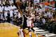 MIAMI, FL - JUNE 18: Kawhi Leonard #2 of the San Antonio Spurs goes up for a dunk over Mike Miller #13 of the Miami Heat in the first quarter of Game Six of the 2013 NBA Finals at AmericanAirlines Arena on June 18, 2013 in Miami, Florida. NOTE TO USER: User expressly acknowledges and agrees that, by downloading and or using this photograph, User is consenting to the terms and conditions of the Getty Images License Agreement. (Photo by Kevin C. Cox/Getty Images)