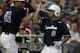 Jun 20, 2013; Omaha, NE, USA; North Carolina Tarheels runner Parks Jordan (8) celebrates his run with Kent Emanuel (41) against the North Carolina State Wolfpack during the College World Series game at TD Ameritrade Park. Mandatory Credit: Bruce Thorson-USA Today Sports