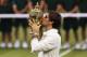 LONDON, ENGLAND - JULY 08: Roger Federer of Switzerland kisses the winner's trophy after winning his Gentlemen's Singles final match against Andy Murray of Great Britain on day thirteen of the Wimbledon Lawn Tennis Championships at the All England Lawn Tennis and Croquet Club on July 8, 2012 in London, England. (Photo by Julian Finney/Getty Images)
