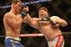 Jun 15, 2013; Winnipeg, MB, Canada; Roy Nelson (right) fights Stipe Miocic during their Heavyweight bout at UFC 161 at MTS Centre. Mandatory Credit: Tom Szczerbowski-USA TODAY Sports