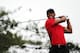 ARDMORE, PA - JUNE 16: Tiger Woods of the United States hits his tee shot on the fifth hole during the final round of the 113th U.S. Open at Merion Golf Club on June 16, 2013 in Ardmore, Pennsylvania. (Photo by Rob Carr/Getty Images)