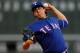 BOSTON, MA - JUNE 6: Derek Holland #45 of the Texas Rangers pitches against the Boston Red Sox at Fenway Park on June 6, 2013 in Boston, Massachusetts. (Photo by Jim Rogash/Getty Images)