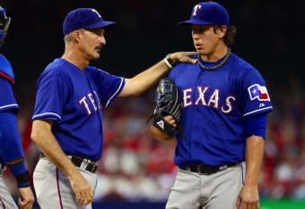 Derek Holland settled down after surrendering four runs in his through 2 innings.